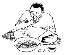 Un homme africain assis devant un grand bol de nourriture et qui mange. Le bol contient des céréales, de la viande et des légumes.