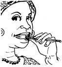 Une femme qui se nettoie les dents avec un bâton