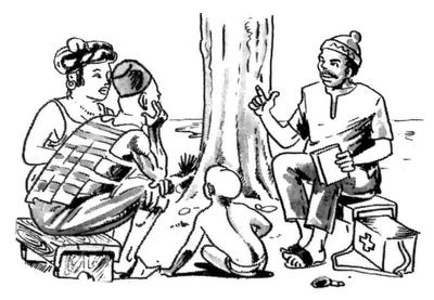 Un agent de santé communautaire assis avec une famille du village et discutant avec eux.